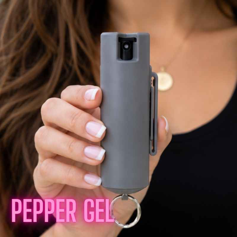 female-holding-guard-dog-slime-pepper-gel-keychain