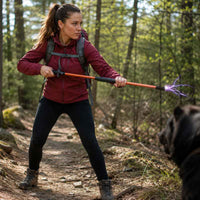 female-using-hike-strike-stun-gun-walking-stick