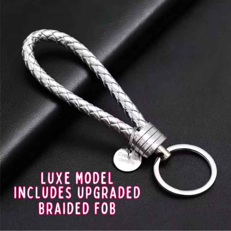 Silver braided keychain on a black background with text about an upgraded braided fob.