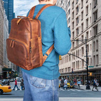 quinn-leather-ccw-backpack-on-boy-walking-city-street