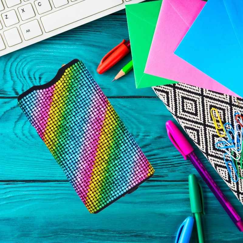 rainbow-rhinestone-stun-gun-bling-taser-on-desk