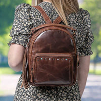 sawyer-leather-ccw-lockable-firearm-backpack-on-model