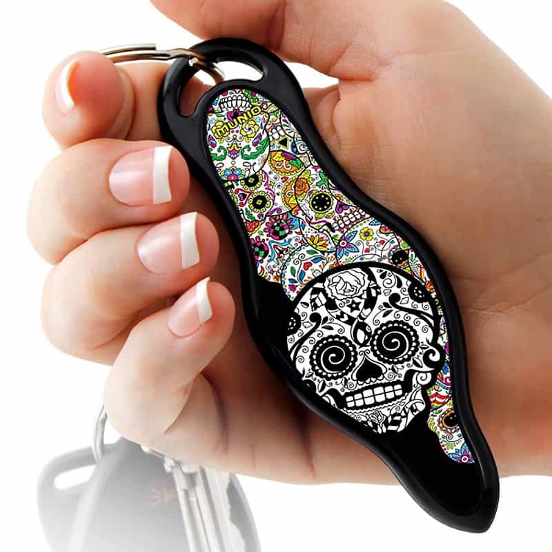 munio SUGAR SKULL self defense key ring in hand