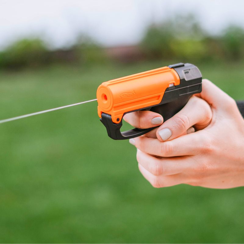 sabre aim and fire pistol grip pepper gel gun in use